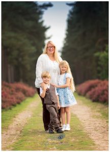 Mum with children in forest with heather borders Life in Focus Portraits family vacation photographer Arrochar Loch Long