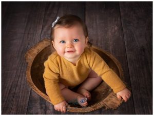 baby girl 8 month old sitting up baby milestones Life in Focus Portraits baby and child photo sessions Rhu Helensburgh