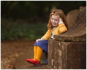 girl in bright clothes laughing Life in Focus Portraits child photographer Rhu Helensburgh