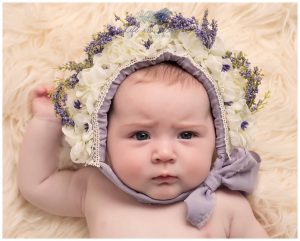 4 month old baby girl in flower bonnet Life in Focus Portraits baby photographer Helensurgh Garelchead Rosneath Peninsula