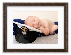 Royal navy baby on Daddy's submariner cap Life in Focus Portraits Helensburgh photography studio Faslane Garelochhead Rhu