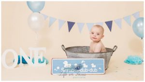Splash time 1st birthday photoshoot bath time after cake smash Life in Focus Portraits baby photographer Rhu Helensburgh Cardross