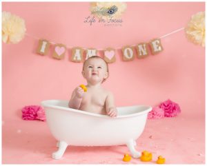 baby girl in bathtub pink themed cake smash photoshoot Life in Focus Portraits baby photographer Arrochar Tarbet Luss