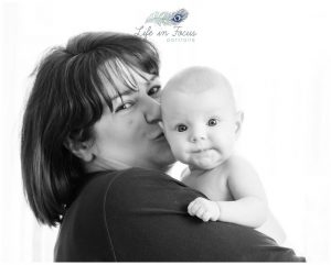black and white photo mum kissing baby daughter Life in Focus Portraits baby photoshoots Helensburgh Cardross Dumbarton