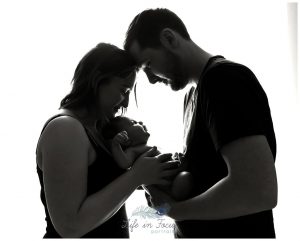 black and white silhouette photo of new parents with baby Life in Focus Portraits baby and family photoshoots Helensburgh