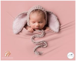 newborn baby in bunny bonnet award winning photos Life in Focus Portraits Helensburgh best newborn baby photographer