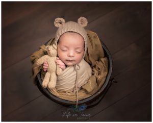 photograph of newborn baby boy holding teddy Life in Focus Portraits newbonr baby photographer Rhu Helensburgh Cardross Dumbarton