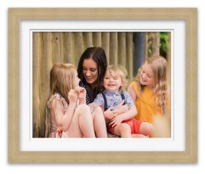 photo of children snuggling Mum in park Life in Focus Portraits outdoor family photoshoots Helensburgh