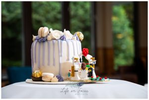 photo of wedding cake with lego figure decorations Loch Lomond wedding